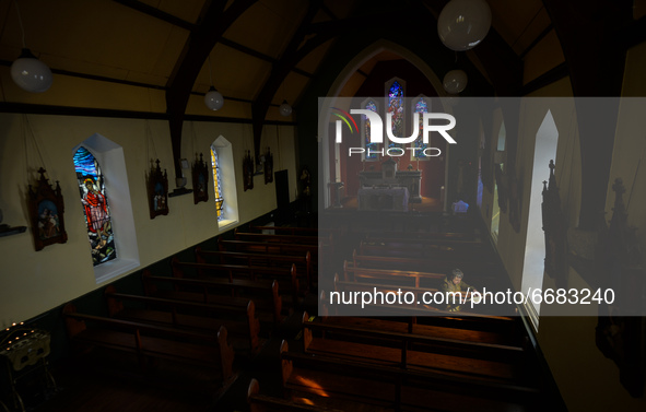 Father Krzysztof Sikora inside St James's Church, in Cashel, Connemara.

Geographically, Roundstone parish is considered Ireland's largest p...