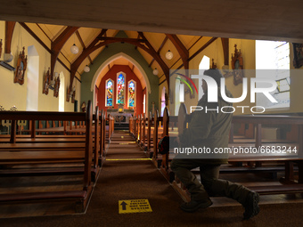 Father Krzysztof Sikora inside St James's Church, in Cashel, Connemara.

Geographically, Roundstone parish is considered Ireland's largest p...