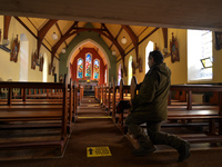 Father Krzysztof Sikora inside St James's Church, in Cashel, Connemara.

Geographically, Roundstone parish is considered Ireland's largest p...