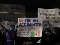 Demonstrators at ground zero on Avenida Tláhuac following the collapse of Metro line 12 on the night of May 3 between Tezonco and Olivos sta...