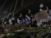 A marching band performs a march in zone zero on Tláhuac Avenue after the collapse of Metro line 12 on the night of May 3 between Tezonco an...