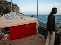 A tent with written "We don't going to Back", in Ventimiglia, on the French-Italian border, on June 23, 2015. The situation of migrants camp...