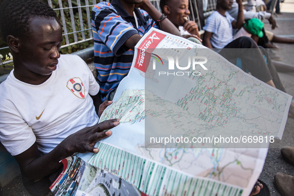 A migrant with Italy maps, in Ventimiglia, on June 24, 2015.  The situation of migrants camped in Ventimiglia has not changed except for the...