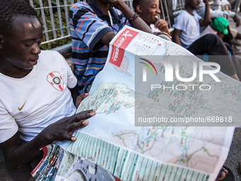 A migrant with Italy maps, in Ventimiglia, on June 24, 2015.  The situation of migrants camped in Ventimiglia has not changed except for the...