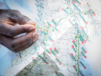 A migrant with Italy maps, in Ventimiglia, on June 24, 2015.  The situation of migrants camped in Ventimiglia has not changed except for the...