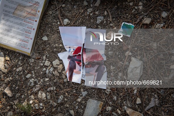 Photo torn at the "trail of death", there are several remnants of recent migrants from the trail, in Ventimiglia at the French-Italian borde...