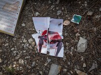 Photo torn at the "trail of death", there are several remnants of recent migrants from the trail, in Ventimiglia at the French-Italian borde...