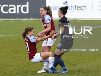  Anouk Denton of West Ham United WFC ( on Loan from Arsenal) gets a helping hand from Lucy Bronze of Manchester City WFC   during  Barclays...