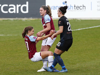  Anouk Denton of West Ham United WFC ( on Loan from Arsenal) gets a helping hand from Lucy Bronze of Manchester City WFC   during  Barclays...