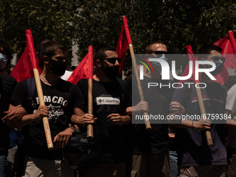 Students holding a flags during a protest  in Athens, Greece, on May 27, 2021. (