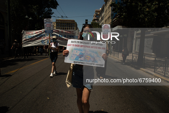 A student is holding a banner in Athens, Greece, on May 27, 2021. 