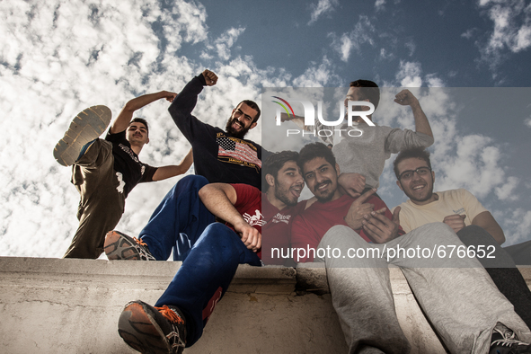 Parkour performers in Ekbatan are posing for the group photograph. 