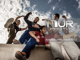 Parkour performers in Ekbatan are posing for the group photograph. (