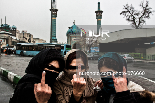 Portrait of three young girls on a day of anniversary of death of prophet Mohammed 