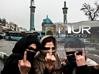 Portrait of three young girls on a day of anniversary of death of prophet Mohammed (