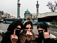 Portrait of three young girls on a day of anniversary of death of prophet Mohammed (