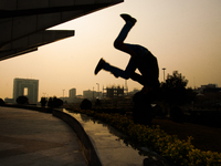 Siluete of parkour performer. (