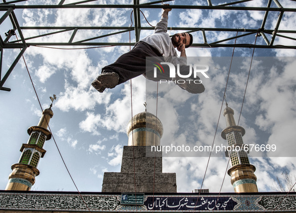 Parkour performer and the mosque in the background. 