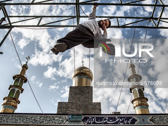 Parkour performer and the mosque in the background. (