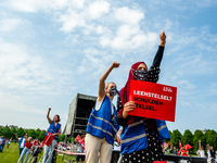 Two students are shouting, during the Nationwide student strike, organized in The Hague, Netherlands on June 3rd, 2021. (