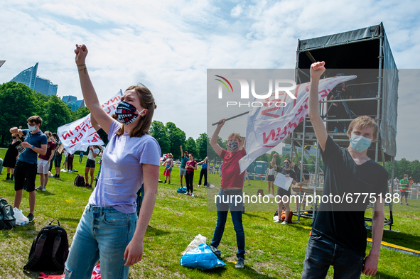 Students are raising their hands in the air, during the Nationwide student strike, organized in The Hague, Netherlands on June 3rd, 2021. 