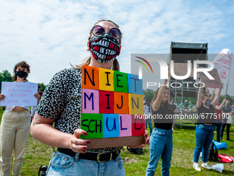 A student is holding a placard that says in Dutch it's not my fault, during the Nationwide student strike, organized in The Hague, Netherlan...