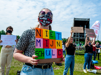 A student is holding a placard that says in Dutch it's not my fault, during the Nationwide student strike, organized in The Hague, Netherlan...