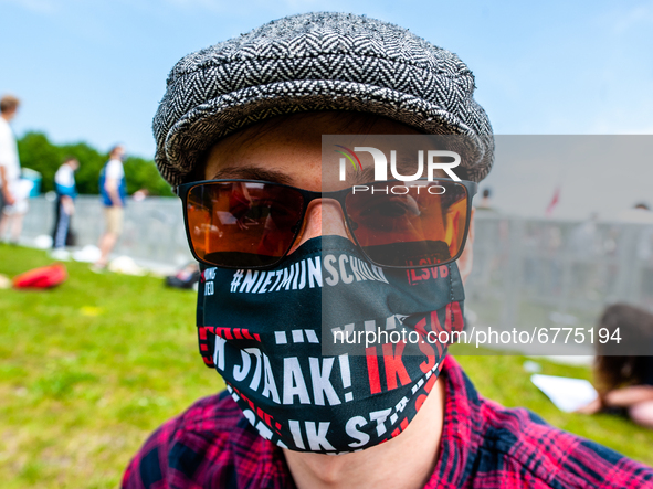 A student is wearing a mouth mask with the message it's not my fault, the slogan of the protest, during the Nationwide student strike, organ...