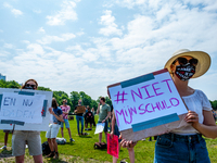 A student is holding a placard that says in Dutch it's not my fault, during the Nationwide student strike, organized in The Hague, Netherlan...