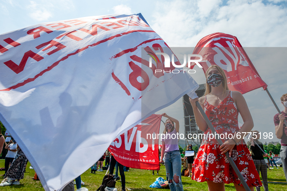 Students are holding flags from student syndicates, during the Nationwide student strike, organized in The Hague, Netherlands on June 3rd, 2...