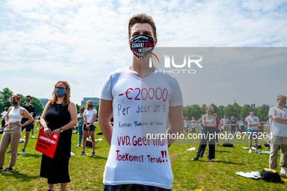 A student is wearing a t shirt with a message against the loan system written on it, during the Nationwide student strike, organized in The...