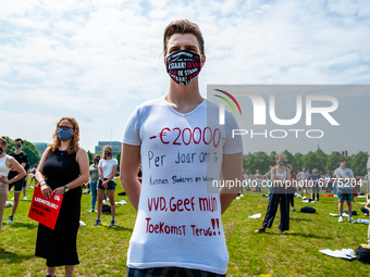 A student is wearing a t shirt with a message against the loan system written on it, during the Nationwide student strike, organized in The...