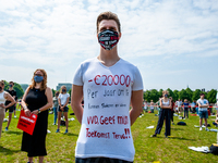 A student is wearing a t shirt with a message against the loan system written on it, during the Nationwide student strike, organized in The...