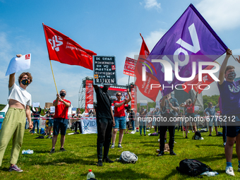 Several students are holding flags from different political parties, during the Nationwide student strike, organized in The Hague, Netherlan...