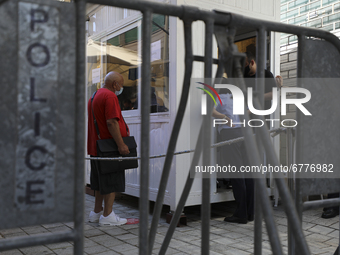 A man waits to cross the re-opened Ledra's Street checkpoint next to the UN buffer zone, after almost one year close down in Nicosia. Cyprus...