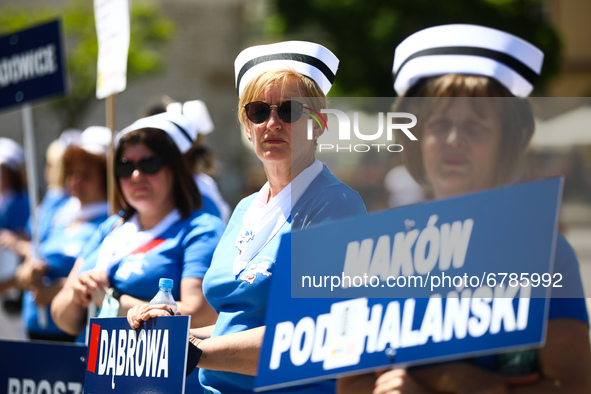 Polish nurses and midwives protest during Warning Strike at the Main Square in Krakow, Poland, on June 7, 2021. Nurses and midwives from aro...