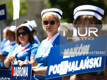 Polish nurses and midwives protest during Warning Strike at the Main Square in Krakow, Poland, on June 7, 2021. Nurses and midwives from aro...