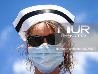 Polish nurses and midwives protest during Warning Strike at the Main Square in Krakow, Poland, on June 7, 2021. Nurses and midwives from aro...