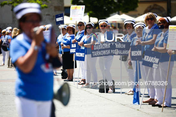 Polish nurses and midwives protest during Warning Strike at the Main Square in Krakow, Poland, on June 7, 2021. Nurses and midwives from aro...