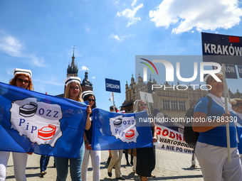 Polish nurses and midwives protest during Warning Strike at the Main Square in Krakow, Poland, on June 7, 2021. Nurses and midwives from aro...