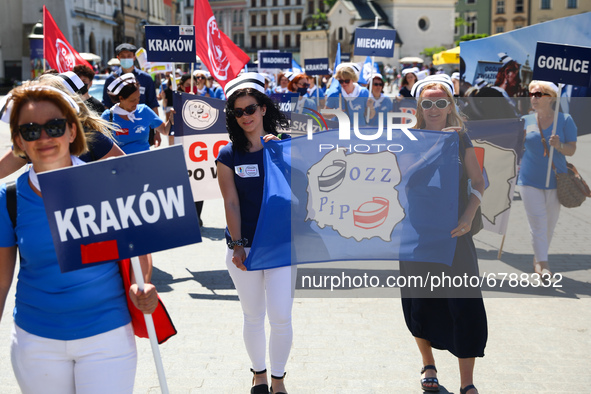 Polish nurses and midwives protest during Warning Strike at the Main Square in Krakow, Poland, on June 7, 2021. Nurses and midwives from aro...