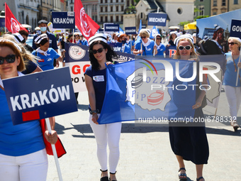 Polish nurses and midwives protest during Warning Strike at the Main Square in Krakow, Poland, on June 7, 2021. Nurses and midwives from aro...