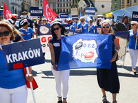 Polish nurses and midwives protest during Warning Strike at the Main Square in Krakow, Poland, on June 7, 2021. Nurses and midwives from aro...