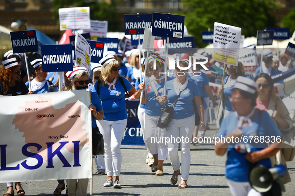 Polish nurses and midwives protest during Warning Strike at the Main Square in Krakow, Poland, on June 7, 2021. Nurses and midwives from aro...