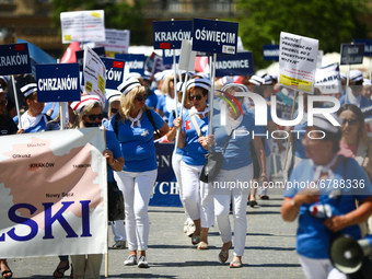 Polish nurses and midwives protest during Warning Strike at the Main Square in Krakow, Poland, on June 7, 2021. Nurses and midwives from aro...