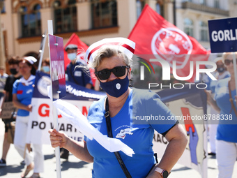 Polish nurses and midwives protest during Warning Strike at the Main Square in Krakow, Poland, on June 7, 2021. Nurses and midwives from aro...