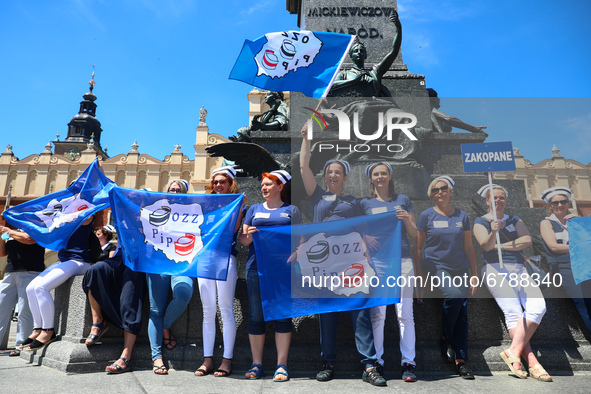 Polish nurses and midwives protest during Warning Strike at the Main Square in Krakow, Poland, on June 7, 2021. Nurses and midwives from aro...