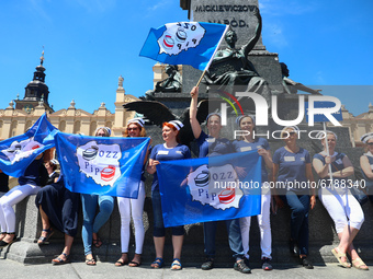 Polish nurses and midwives protest during Warning Strike at the Main Square in Krakow, Poland, on June 7, 2021. Nurses and midwives from aro...