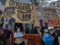 Teacher, Students and Workers of the UPR (University of Puerto Rico) protest against a budget cut of $94 million imposed by the Fiscal Contr...