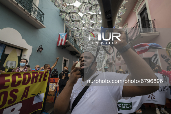 Teacher, Students and Workers of the UPR (University of Puerto Rico) protest against a budget cut of $94 million imposed by the Fiscal Contr...